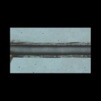 immagine al microscopio ottico di pet tagliato a laser da 9,3